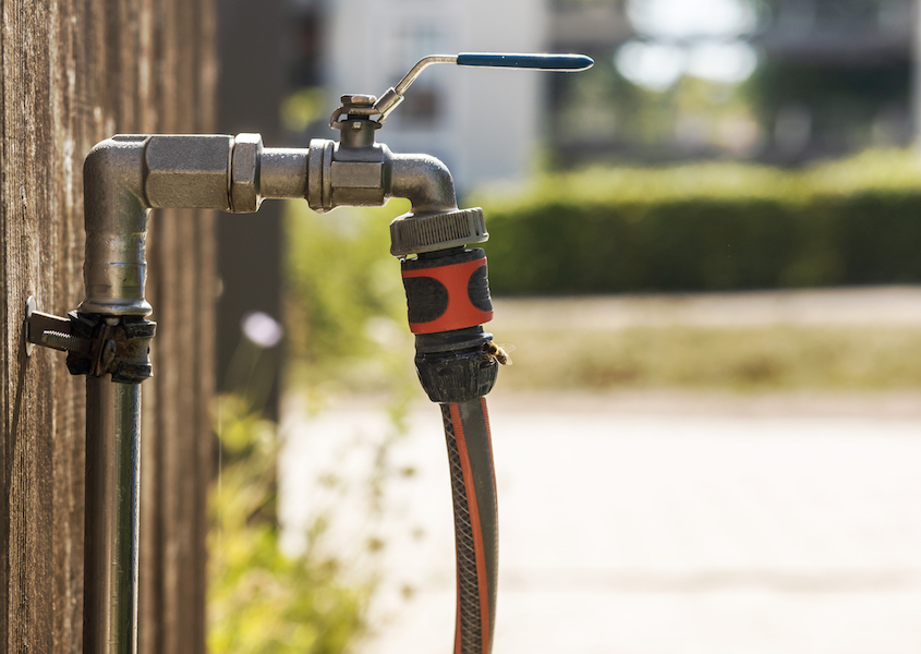 tap outside with watering hose pipe faucet external wall garden water hose pipe